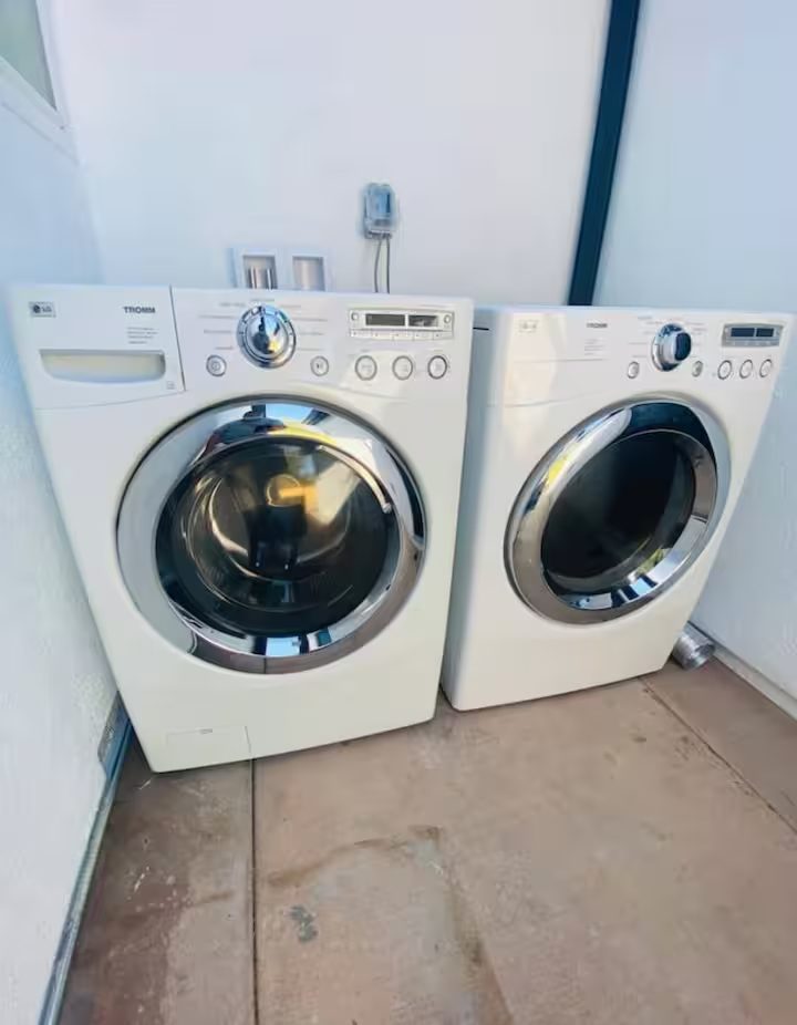 The washer and dryer at the back of the house