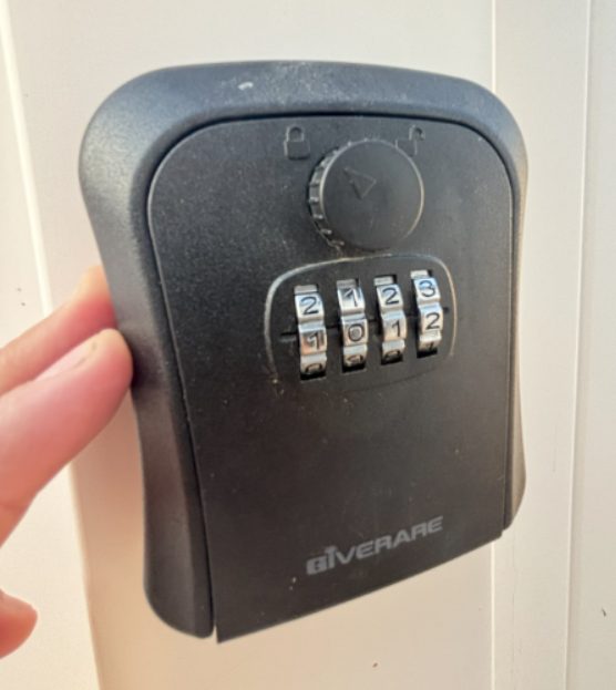 Close-up of the lock box: dial in the code to open it and get your keys